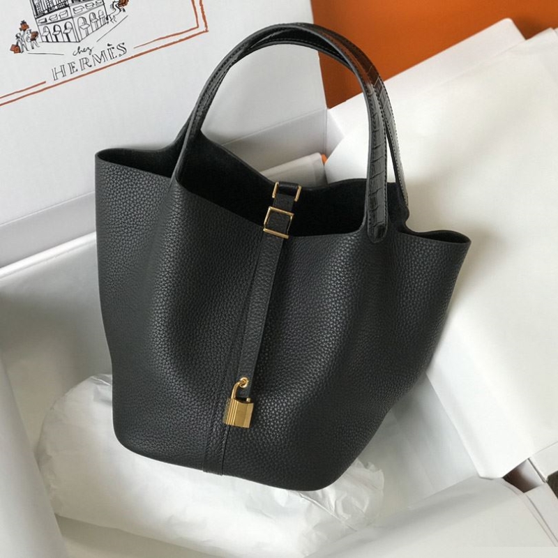 H**mes shopping bags